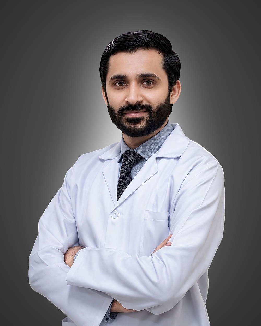 Dr. Salman Falak, consultant neurosurgeon in Lahore, in a white coat